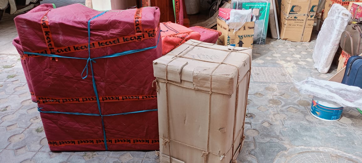 Unloading team carrying goods