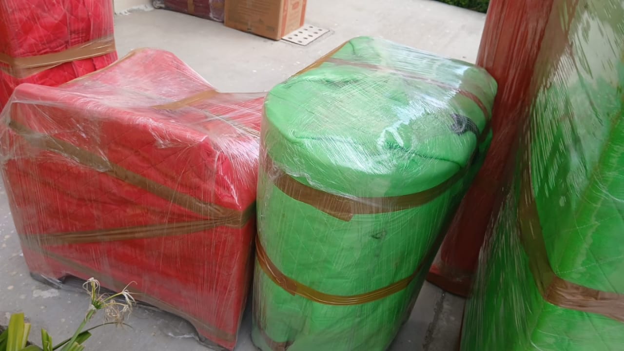 Professional packers packing boxes